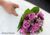 cool water roseand calla head to head handtie bride's bouquet