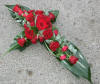 Red rose cross funeral flowers